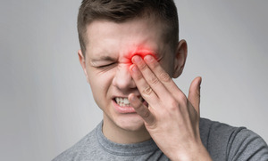 Man with significant pain in his eye